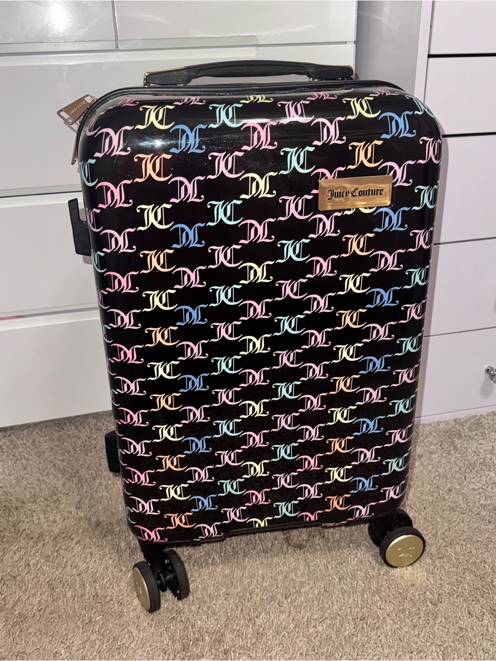 Juicy Couture Black Hard Shell Carry-On with Pastel Monogram Print